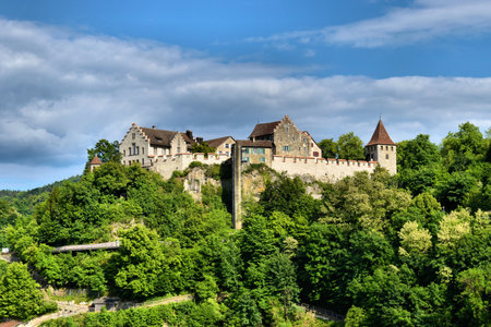 Historic old castle on a hill at the rhine falls in Switzerland 20.5.2020のeditorial素材