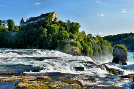 Historic old castle on a hill at the rhine falls in Switzerland 20.5.2020のeditorial素材