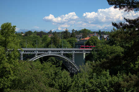 Crossing the Aare river in Bern in Switzerland on a beautiful day in spring 21.5.2020のeditorial素材