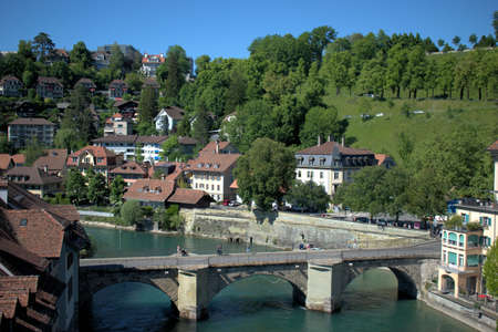 Crossing the Aare river in Bern in Switzerland on a beautiful day in spring 21.5.2020のeditorial素材