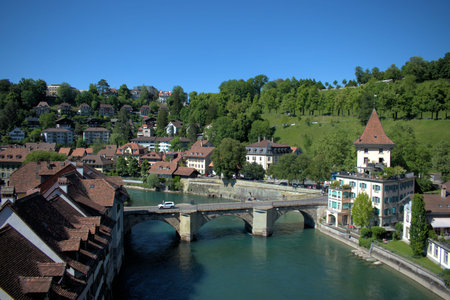 Crossing the Aare river in Bern in Switzerland on a beautiful day in spring 21.5.2020のeditorial素材
