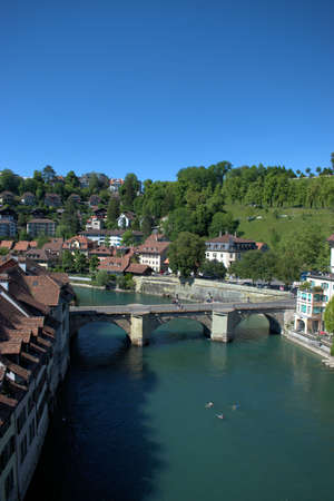 Crossing the Aare river in Bern in Switzerland on a beautiful day in spring 21.5.2020のeditorial素材