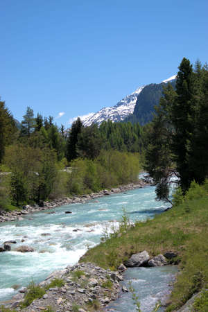 Pretty little mountain river in the Engadine region in Switzerland 27.5.2020