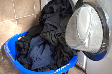 Washing machine overloaded with smelly T-Shirts 11.6.2020の写真素材