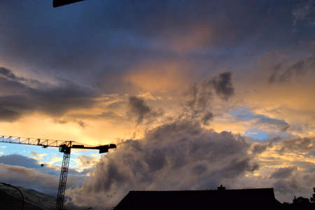 Colorful evening mood and a cumulus cloud over Vaduz in Liechtenstein 2.7.2020の写真素材