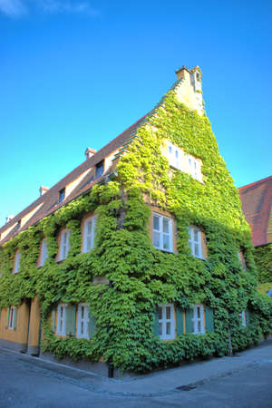 Visiting the historic and traditional Fuggerei in Augsburg in Germany 4.7.2020のeditorial素材