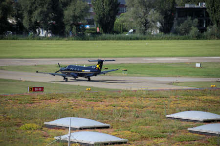 Spotting a Pilatus PC-12 airplane at the aerodrome Saint Gallen Altenrhein in Switzerland 10.7.2020