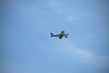 Spotting a Piper Archer airplane during take off at the aerodrome Saint Gallen Altenrhein in...