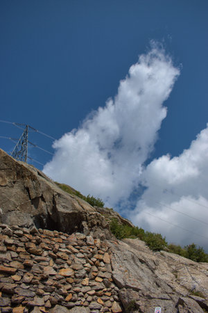 Electric distribution in the alps at the Lukmanierpass in Switzerland 30.7.2020の写真素材