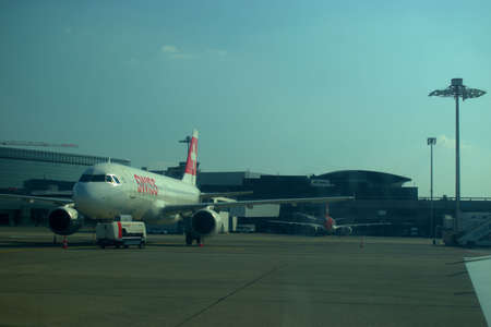 Swiss Airbus A320 is parking on the apron at the Zurich international airport in Switzerland...