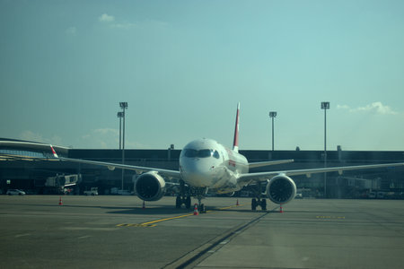 Swiss A220 airplane is parking on the apron at the Zurich international airport in Switzerland 17.9.2020のeditorial素材