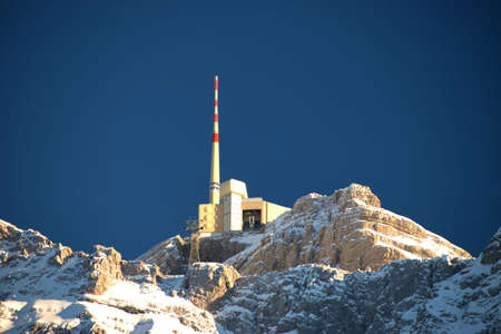 Snow covered summit of the mount Saentis on a wonderful day in winter time 18.12.2020