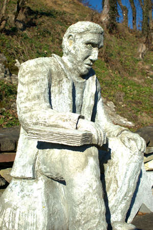 Sculpture of a sitting man in Oberriet in Switzerland 11.1.2021のeditorial素材