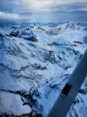 Snow covered mountains in Lech in Austria seen from above 10.2.2017の写真素材