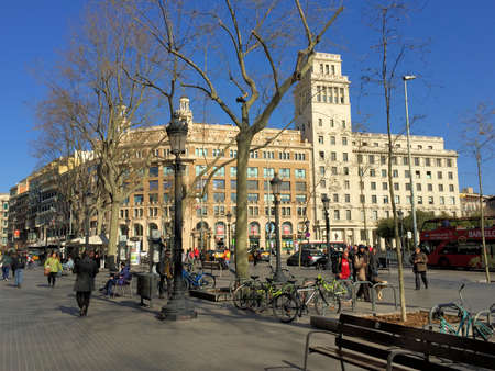People are walking over the plaza de Catalunya in the center of Barcelona in Spain 25.2.2017