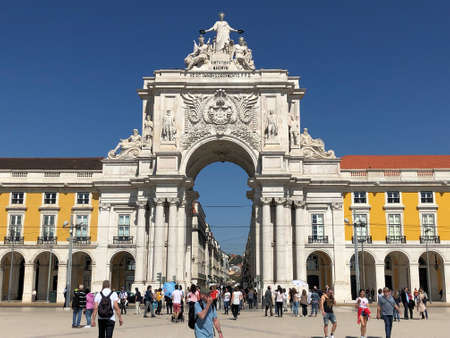 People are walking over the place of commercial in the city of Lisbon in Portugal 25.3.2019