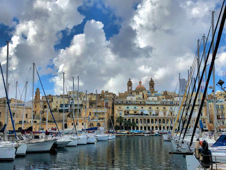 Little harbor with boats in Vittoriosa in Malta 8.3.2020