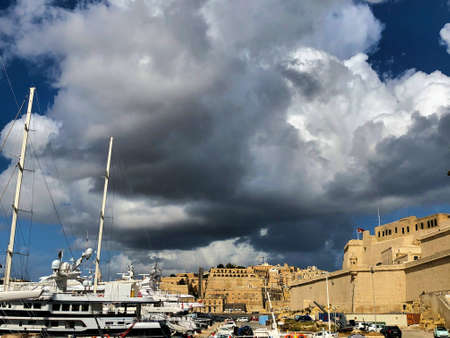 Incredible cumulus cloud over the sea promenade in Vittoriosa in Malta 8.3.2020