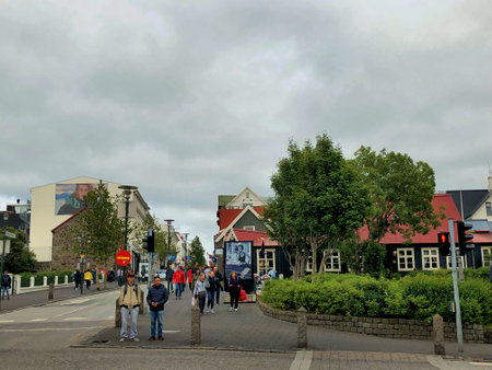 People are walking over a square in the city of Reykjavik in Iceland 28.6.2019のeditorial素材