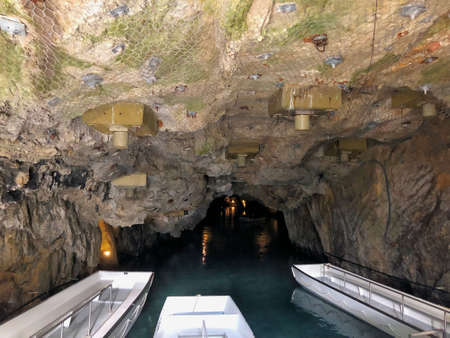 Boats in the Saint Leonard cave near Sion in Switzerland 30.3.2019のeditorial素材