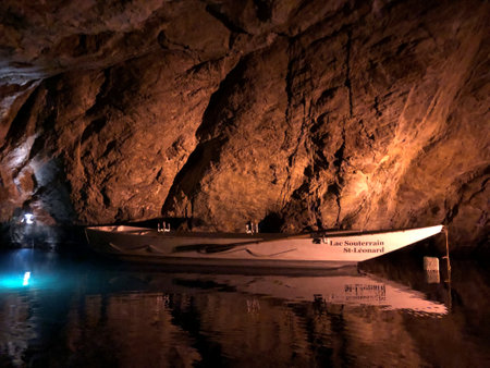 Boat in the illuminated Saint Leonard cave near Sion in Switzerland 30.3.2019のeditorial素材