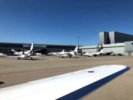 Different aircraft are parking on the apron at the international airport in Zurich in Switzerland 7.7.2020のeditorial素材