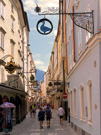 People are walking through the streets in Salzburg in Austria 10.6.2018のeditorial素材