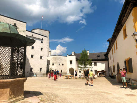 People are visiting the historic old castle in the city of Salzburg in Austria 10.6.2018のeditorial素材