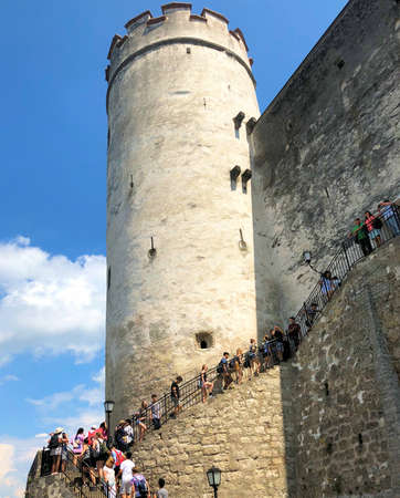 People are visiting the historic old castle in the city of Salzburg in Austria 10.6.2018のeditorial素材