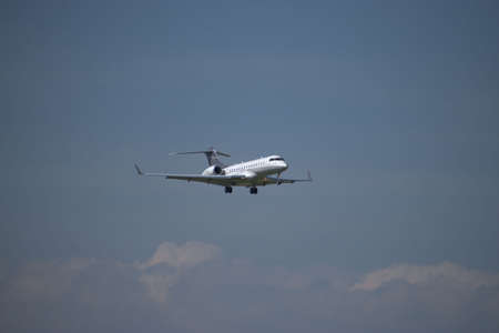 Bombardier Global Express XRS aircraft on the final approach to the international airport in Zurich...