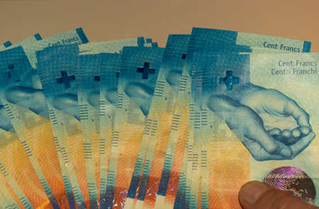 Many swiss francs bills in cash with a value of one hundred each 27.5.2021の写真素材