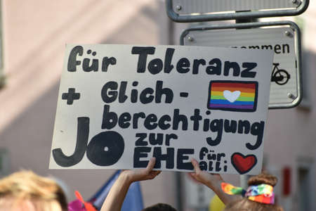 ZURICH, SWITZERLAND, SEPTEMBER 4, 2021 Protesters in the city center holding up their sign with a messageのeditorial素材