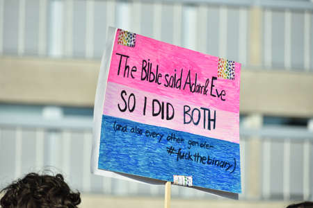 ZURICH, SWITZERLAND, SEPTEMBER 4, 2021 Protesters in the city center holding up their sign with a...