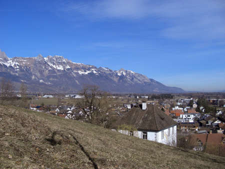 Werdenberg, Switzerland February 26, 2019 Snow covered alps and a panoramic view over the cityのeditorial素材