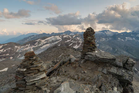 Heap of stones on the peak of the mount Fanellhornの写真素材