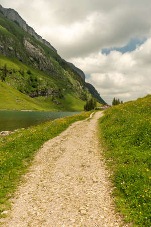 Appenzell, Switzerland, June 13, 2021 Pedestrian way at the edge of the lake Seealpseeの写真素材