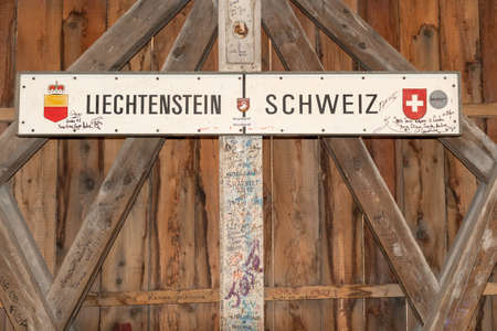 Vaduz, Liechtenstein, October 11, 2021 Plate witch shows the border between Liechtenstein and Switzerland inside the old rhine bridgeのeditorial素材