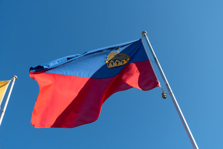 Vaduz, Liechtenstein, October 11, 2021 National flag of the Liechtenstein country is waving in the windの写真素材