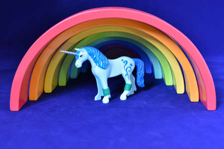 Vaduz, Liechtenstein, October 15, 2021 Colorful rainbow and an unicorn standing belowのeditorial素材