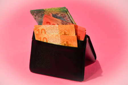 Swiss francs in cash in a walletの写真素材