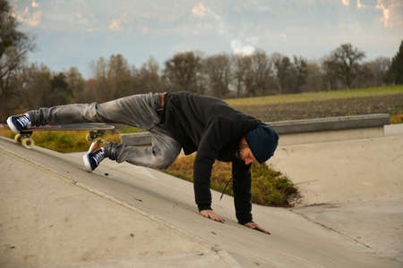 Vaduz, Liechtenstein, November 19, 2021 Guy on a skateboard is performing some cool movesのeditorial素材