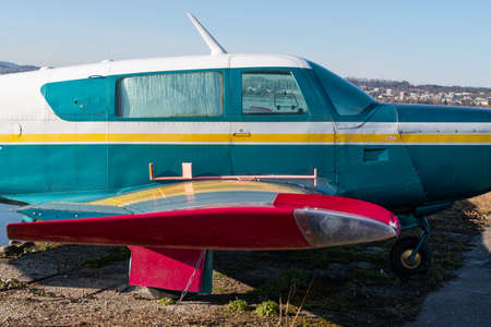 Wangen-Lachen, Switzerland, February 13, 2022 Mooney M20 propeller plane is exhibited on a small...