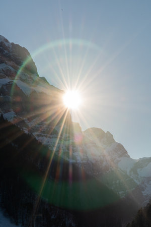 Wasserauen, Appenzell, Switzerland, January 26, 2022 Sun is disappearing behind the majestic alpsの写真素材