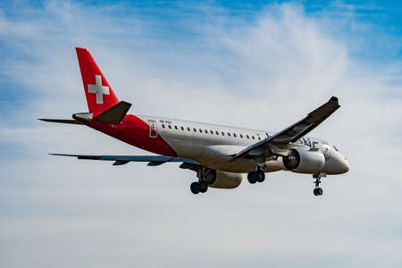 Zurich, Switzerland, February 24, 2022 Helvetic Airways Embraer E190-E2 aircraft on its final...