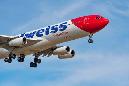 Zurich, Switzerland, February 24, 2022 Edelweiss Air Airbus A340-313X aircraft final approach on runway 14のeditorial素材