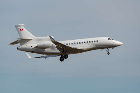 Zurich, Switzerland, February 24, 2022 Dessault Falcon 7X aircraft final approach on runway 14