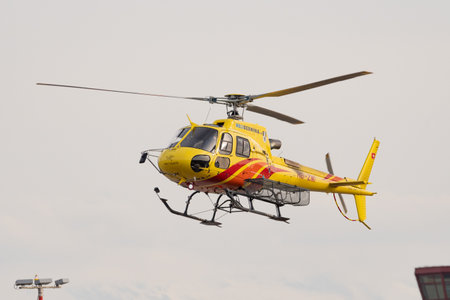 Zurich, Switzerland, February 24, 2022 Eurocopter AS350-B3 is departing from the international airportのeditorial素材
