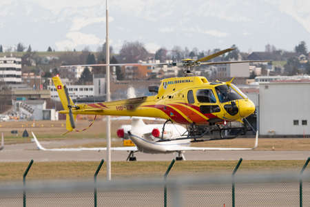 Zurich, Switzerland, February 24, 2022 Eurocopter AS350-B3 is departing from the international...