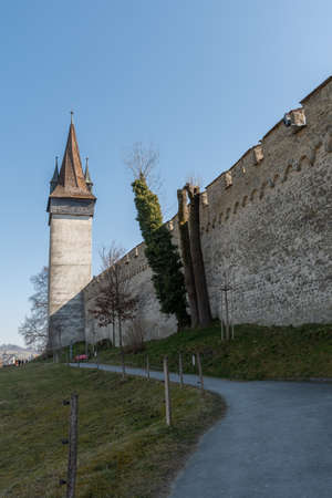 Lucerne, Switzerland, March 10, 2022 Historic old Musegg wall and tower in the city centerのeditorial素材
