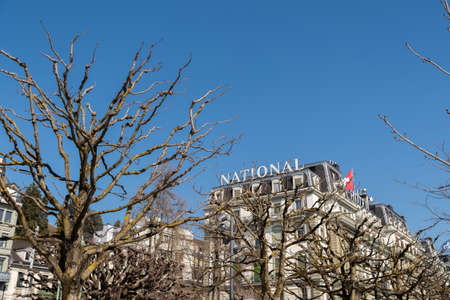 Lucerne, Switzerland, March 10, 2022 Historic architecture at the waterfront on a sunny day